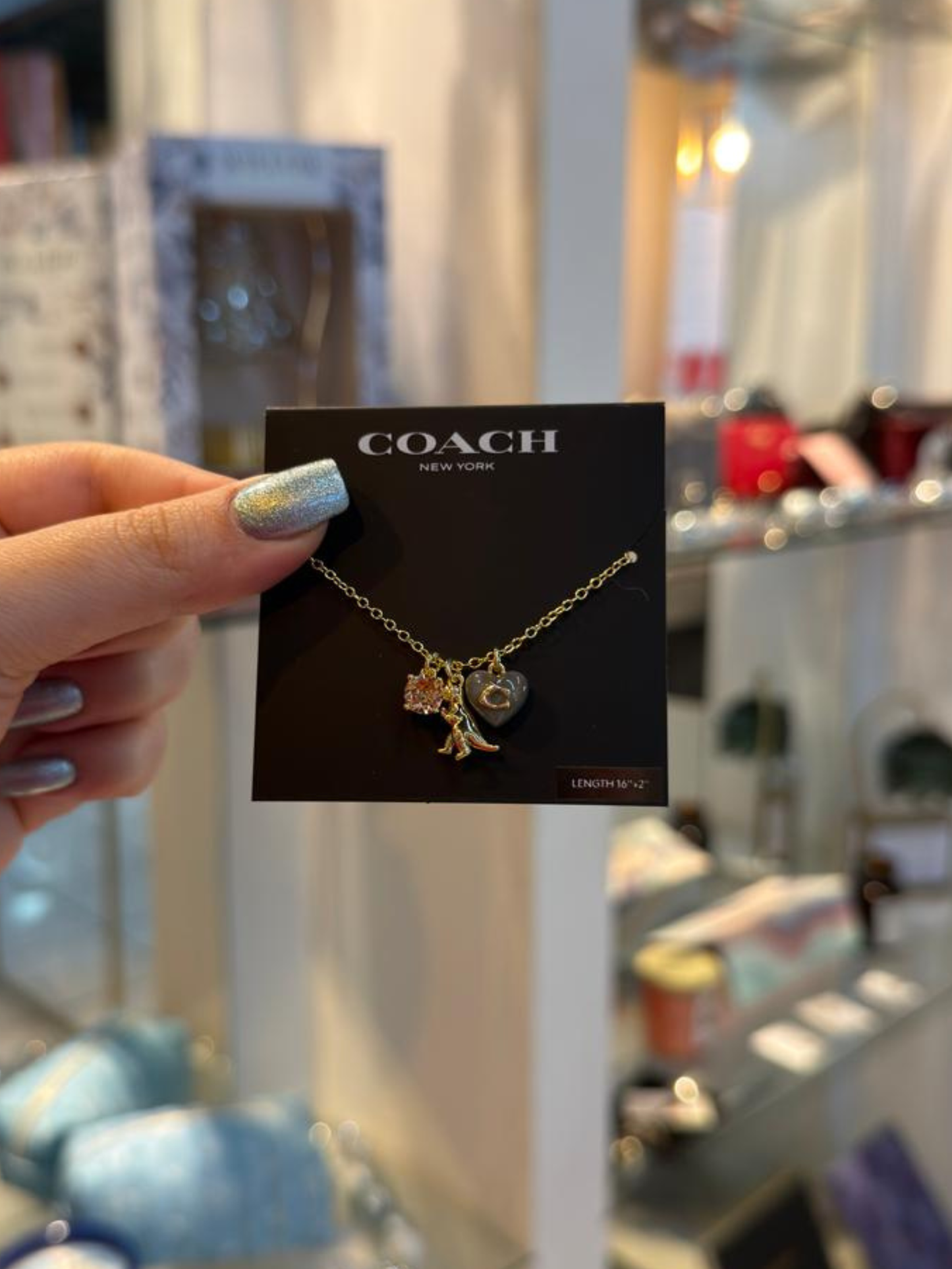 Collar con 3 charms Coach