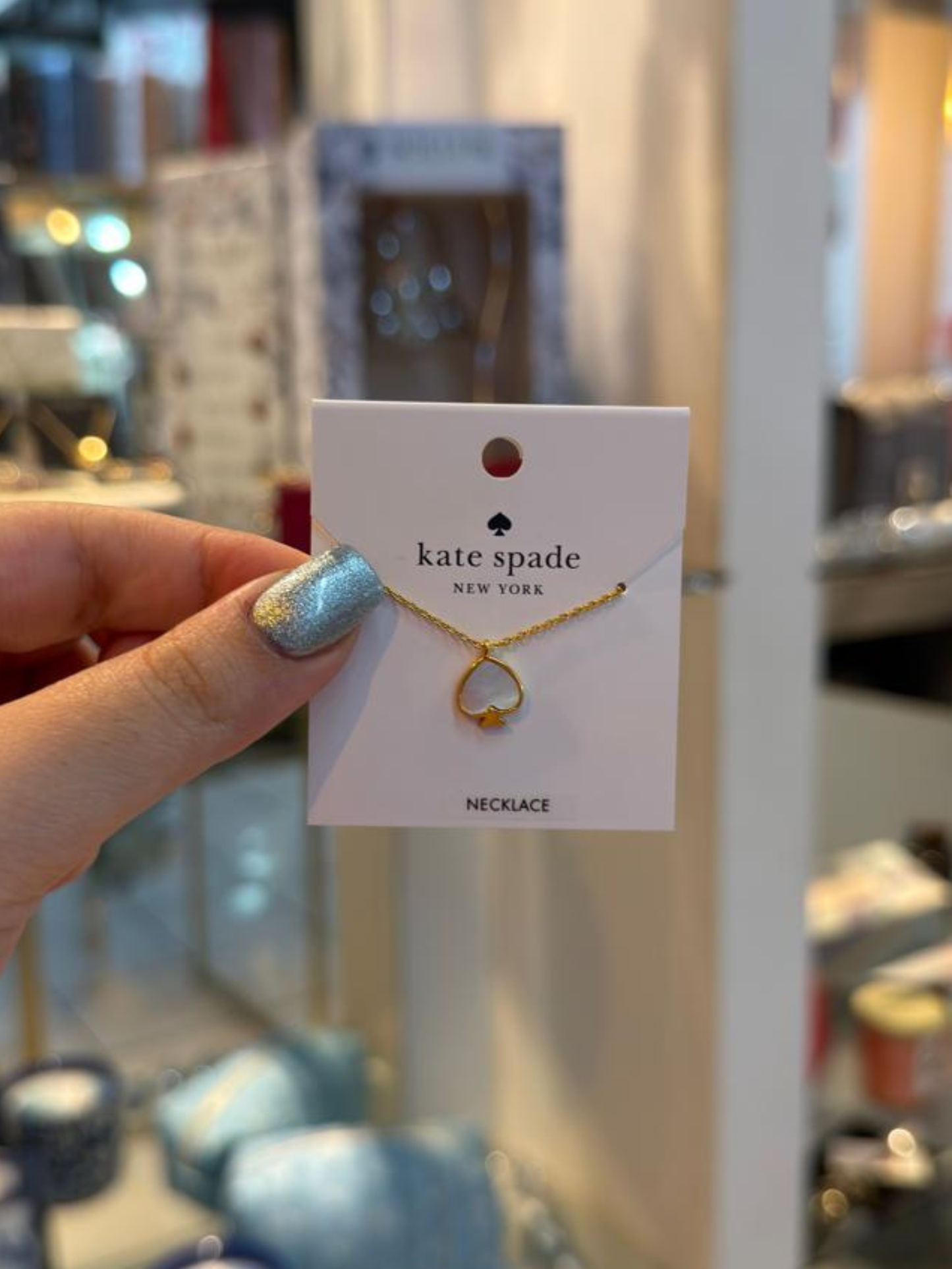 Collar espada tornasol Kate Spade