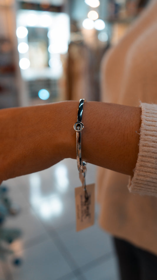 Pulsera plateada coach